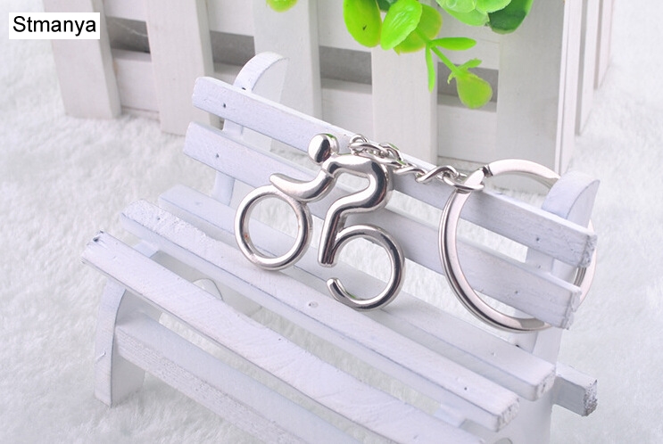 Metal Keychain Riding bicycle  - огляд і ціна Yellow Cycling Gear